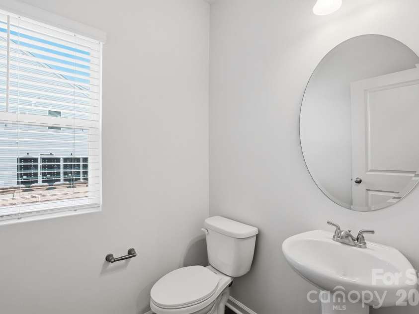 5853 Tuckaseegee Road, Charlotte, NC 28208.  MLS# CAR4401593, YatesRealty ID 1909. Powder room