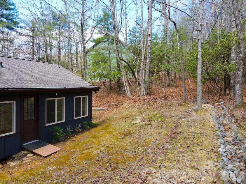 417 Soquili Drive, Brevard, NC 28712.  MLS# CAR4366623, YatesRealty ID 19092. Backyard