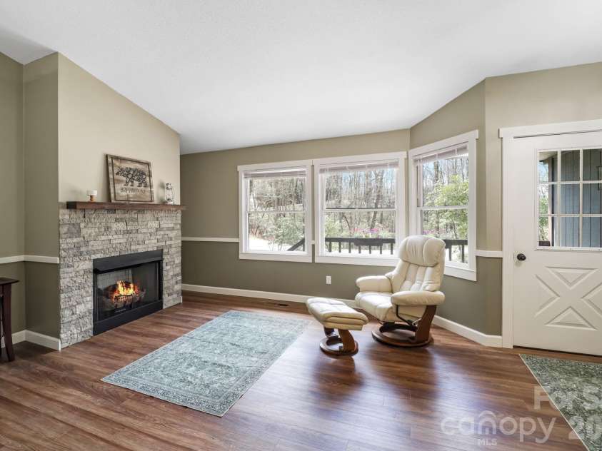 417 Soquili Drive, Brevard, NC 28712.  MLS# CAR4366623, YatesRealty ID 19092. Cozy Fireplace Vibes