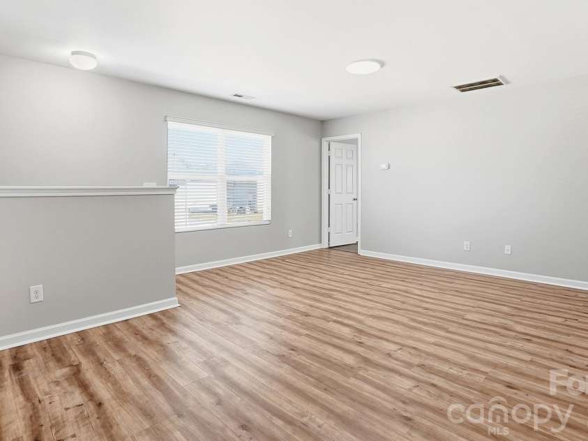 1016 Garden Web Road, Indian Trail, NC 28079.  MLS# CAR4369459, YatesRealty ID 19094. Huge Loft/Bonus Room