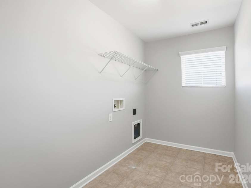 1016 Garden Web Road, Indian Trail, NC 28079.  MLS# CAR4369459, YatesRealty ID 19094. Large Laundry Room