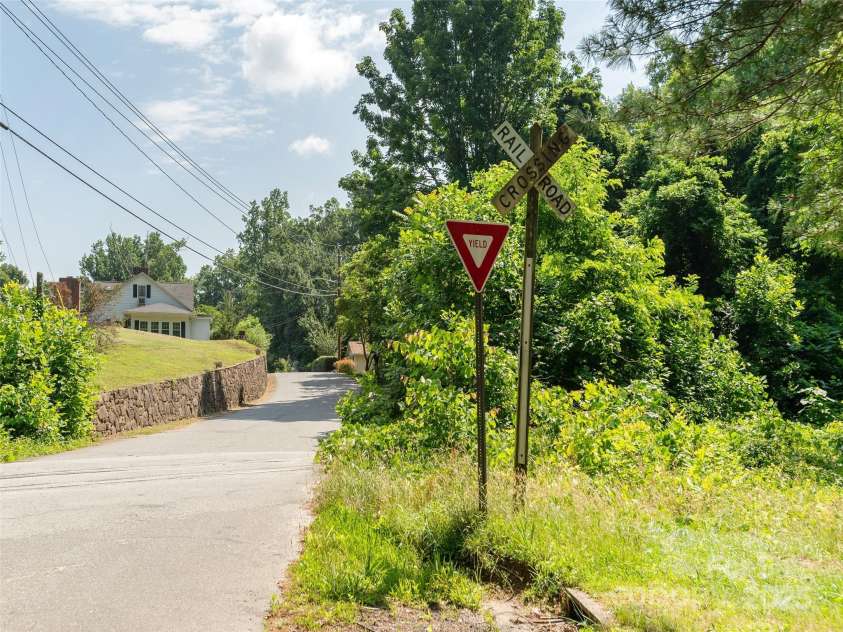 34 Lockhart Road, Tryon, NC 28782.  MLS# CAR4270082, YatesRealty ID 19094. Bordering the proposed Saluda Grade Trail!