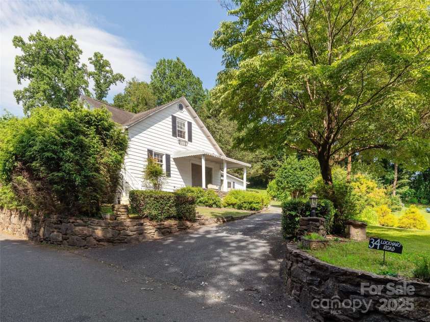 34 Lockhart Road, Tryon, NC 28782.  MLS# CAR4270082, YatesRealty ID 19094. Ton of curb appeal!