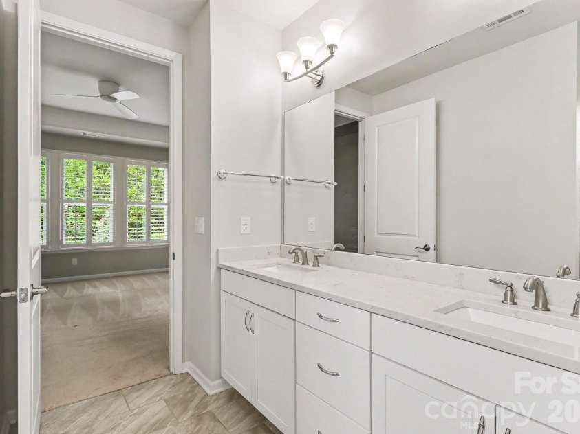 8911 Bur Lane, Huntersville, NC 28078.  MLS# CAR4396787, YatesRealty ID 19095. Double Sink quartz counters ensuite bathroom