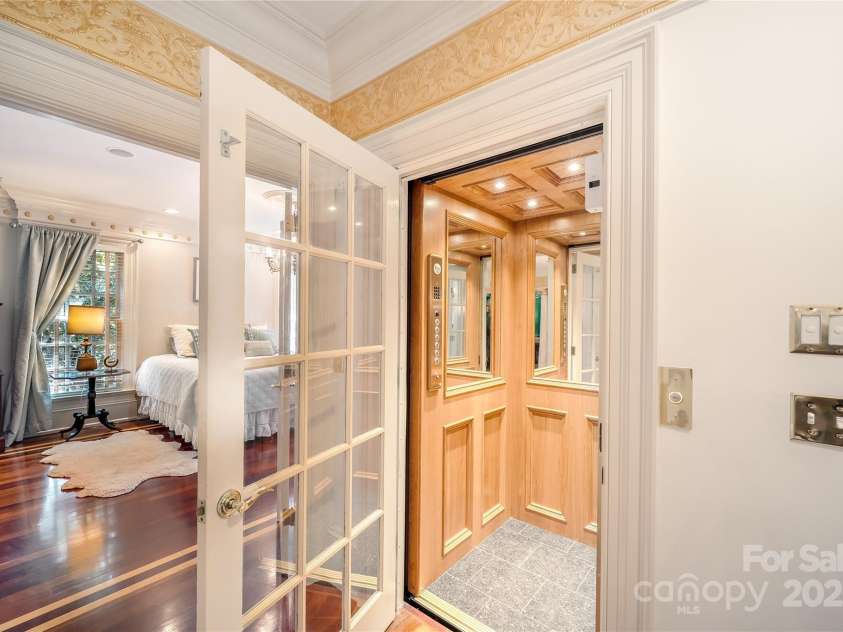 2665 Rolling Hills Drive, Monroe, NC 28110.  MLS# CAR4296531, YatesRealty ID 191. New five story elevator to access every level from garage to attic.