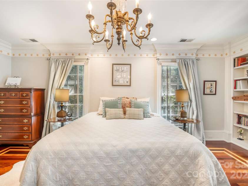 2665 Rolling Hills Drive, Monroe, NC 28110.  MLS# CAR4296531, YatesRealty ID 191. The second primary ensuite is also flooded with natural light and access to the second level covered porch.  Stunning custom mahogany walk in closet is a must see.