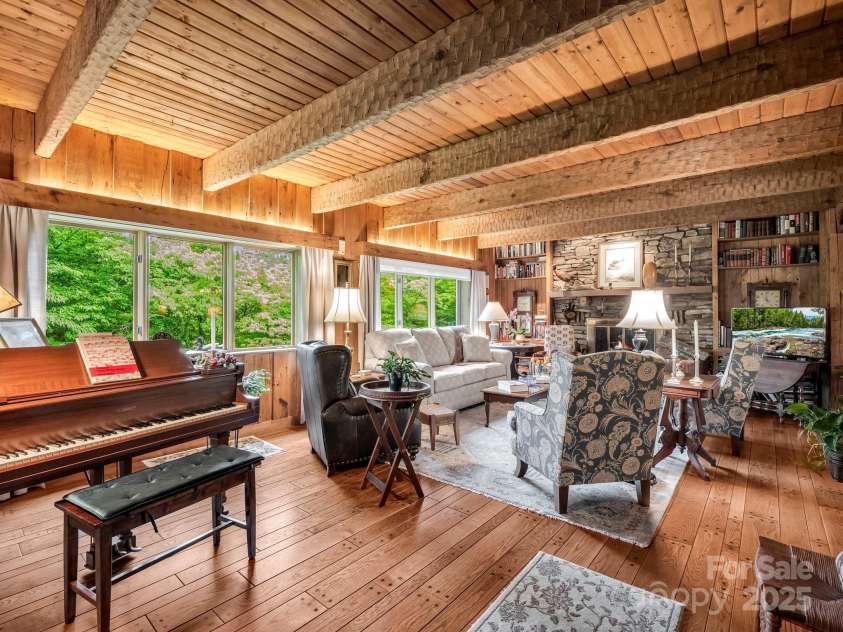 133 Pennwood Lane, Flat Rock, NC 28731.  MLS# CAR4268654, YatesRealty ID 19101. Beautiful hardwood pegged floors in living room.