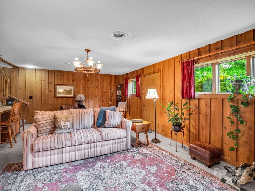 133 Pennwood Lane, Flat Rock, NC 28731.  MLS# CAR4268654, YatesRealty ID 19101. Family Room on Lower Level