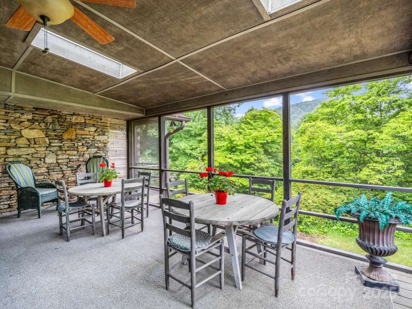 133 Pennwood Lane, Flat Rock, NC 28731.  MLS# CAR4268654, YatesRealty ID 19101. Sip your morning coffee, view the mountain peak and watch the deer!