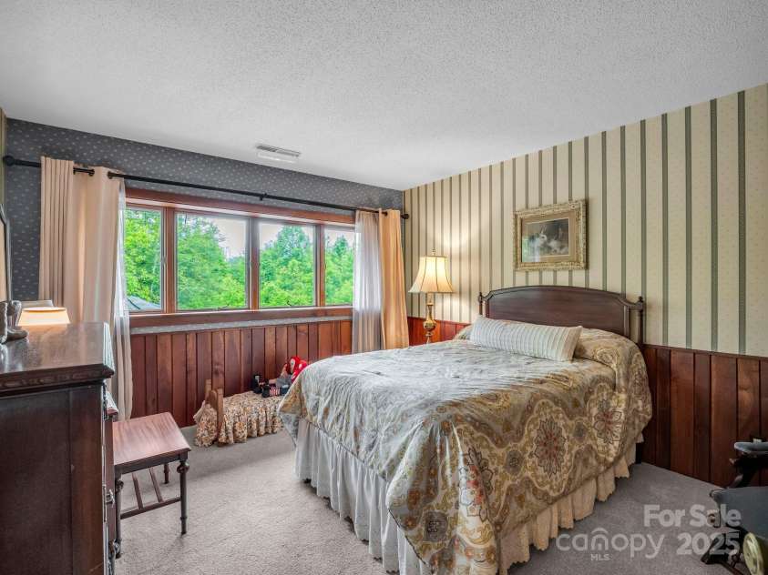 133 Pennwood Lane, Flat Rock, NC 28731.  MLS# CAR4268654, YatesRealty ID 19101. Upstairs Bedroom 2