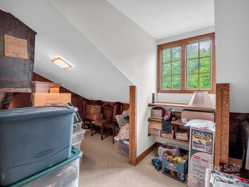 133 Pennwood Lane, Flat Rock, NC 28731.  MLS# CAR4268654, YatesRealty ID 19101. Upstairs Storage