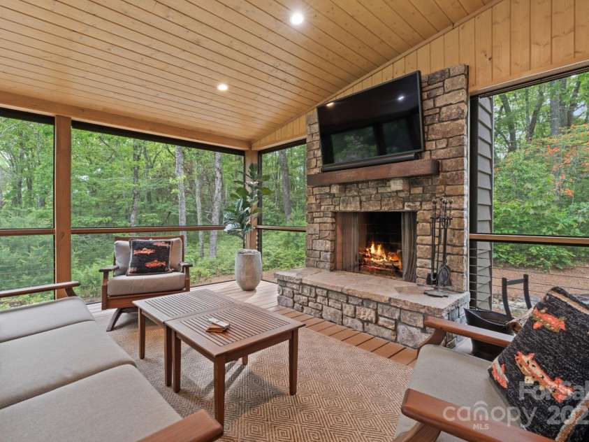 891 Crescent Trail, Highlands, NC 28741.  MLS# CAR4270133, YatesRealty ID 19103. Back Screened Porch