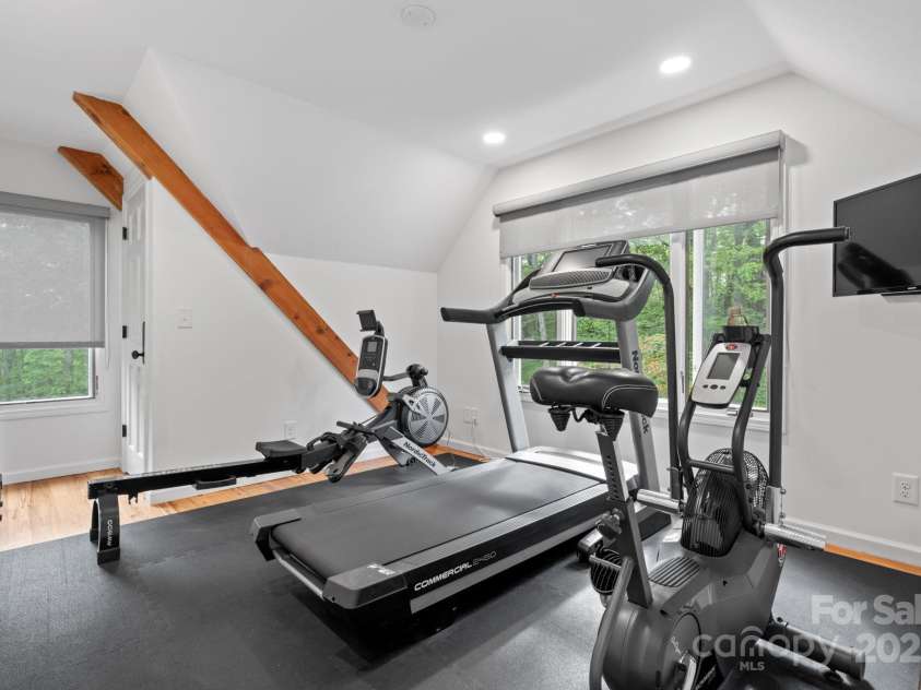 891 Crescent Trail, Highlands, NC 28741.  MLS# CAR4270133, YatesRealty ID 19103. Ensuite Guest Room 2 on Upper Level (Currently a fitness room)