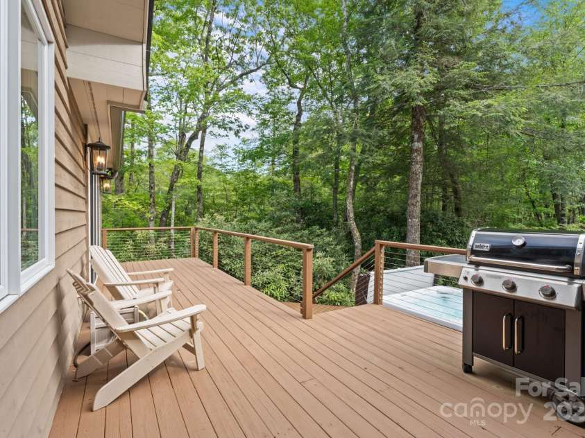 891 Crescent Trail, Highlands, NC 28741.  MLS# CAR4270133, YatesRealty ID 19103. Main House Back Deck
