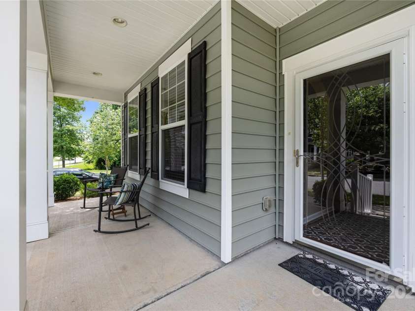 13107 Heath Grove Drive, Huntersville, NC 28078.  MLS# CAR4259470, YatesRealty ID 19108. Covered front porch deep enough to really enjoy.