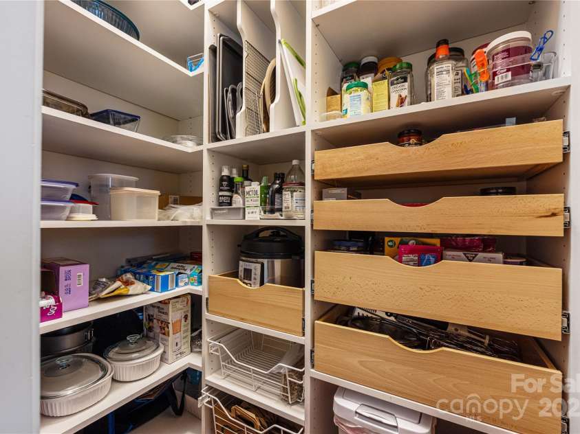13107 Heath Grove Drive, Huntersville, NC 28078.  MLS# CAR4259470, YatesRealty ID 19108. Pantry with custom organization.
