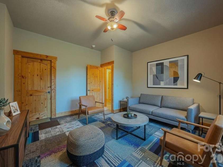 1016 Horizon Trail, Nebo, NC 28761.  MLS# CAR4398740, YatesRealty ID 1911. Virtually staged basement bonus room