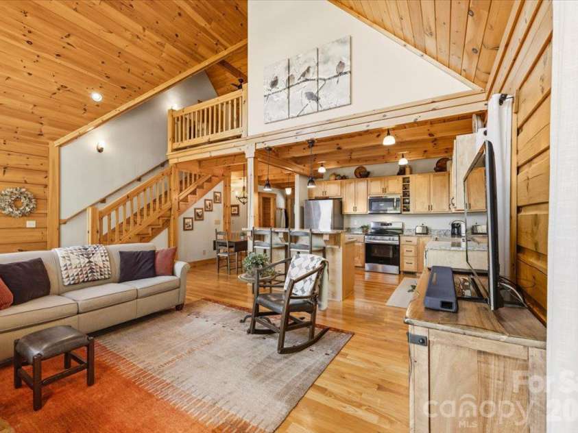 1016 Horizon Trail, Nebo, NC 28761.  MLS# CAR4435934, YatesRealty ID 1911. Great Room, Dining Area & Kitchen Main Level