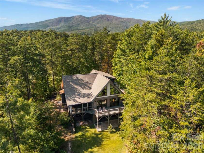 1016 Horizon Trail, Nebo, NC 28761.  MLS# CAR4435934, YatesRealty ID 1911. View of House with Dobson's Knob in Background