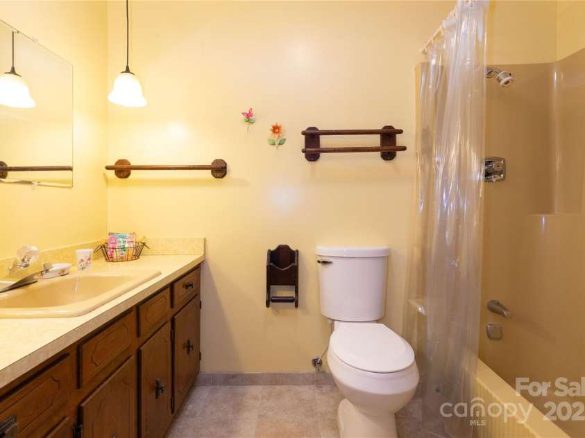 3601 Conleys Creek Road, Whittier, NC 28789.  MLS# CAR4231007, YatesRealty ID 1911. Basement Bathroom
