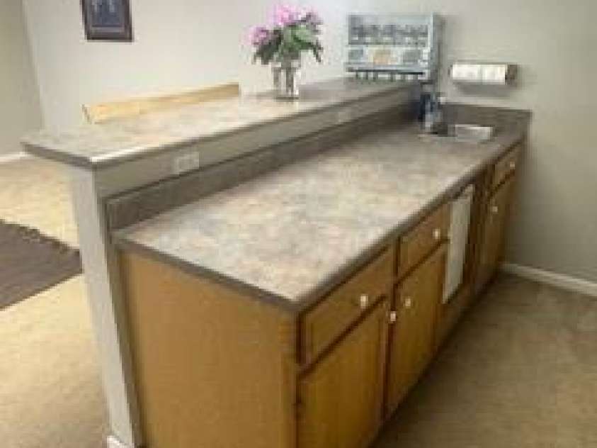 121 Churchill Downs Drive, Fairview, NC 28730.  MLS# CAR4366087, YatesRealty ID 19111. Basement Bar with Sink