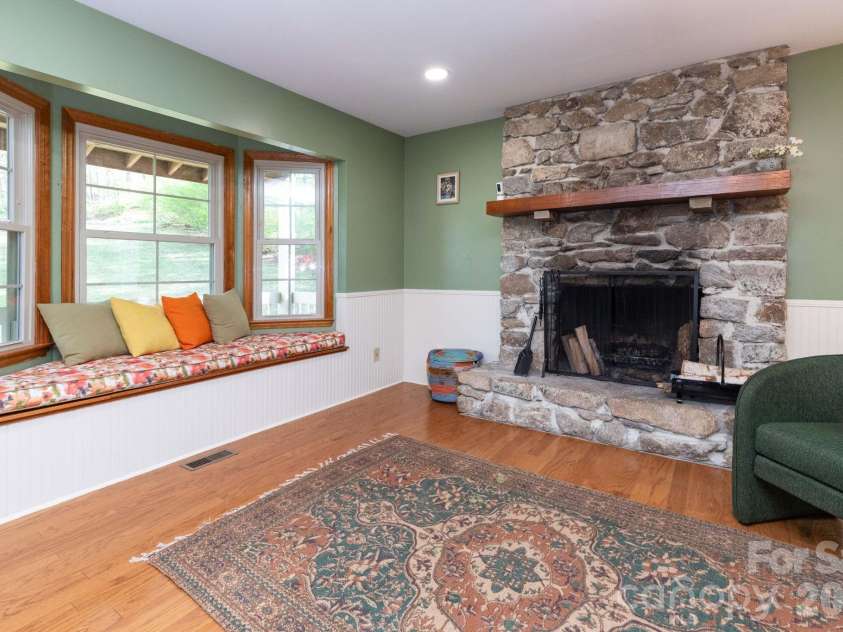 121 Churchill Downs Drive, Fairview, NC 28730.  MLS# CAR4366087, YatesRealty ID 19111. Beautiful Stone Fireplace