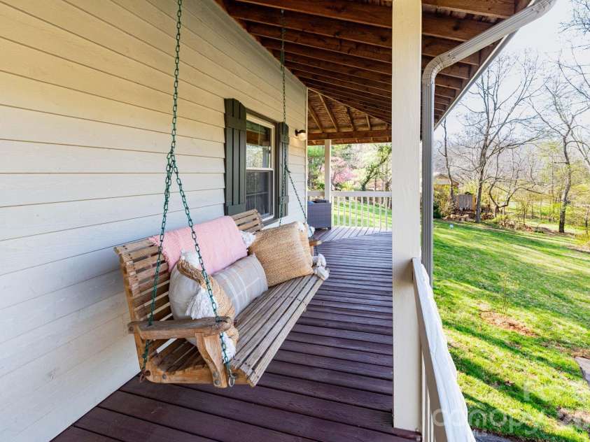 121 Churchill Downs Drive, Fairview, NC 28730.  MLS# CAR4366087, YatesRealty ID 19111. Porch Swing