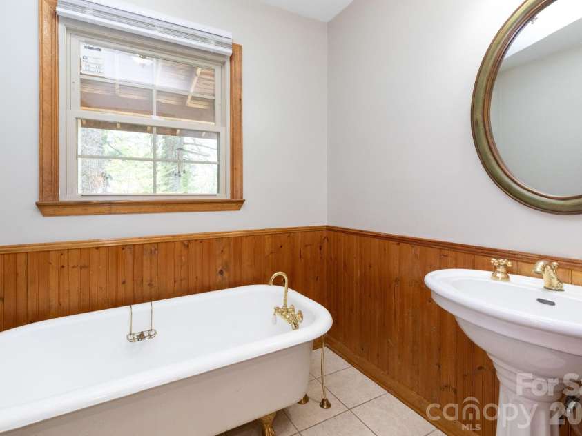 121 Churchill Downs Drive, Fairview, NC 28730.  MLS# CAR4366087, YatesRealty ID 19111. Second Bath with Clawfoot Tub