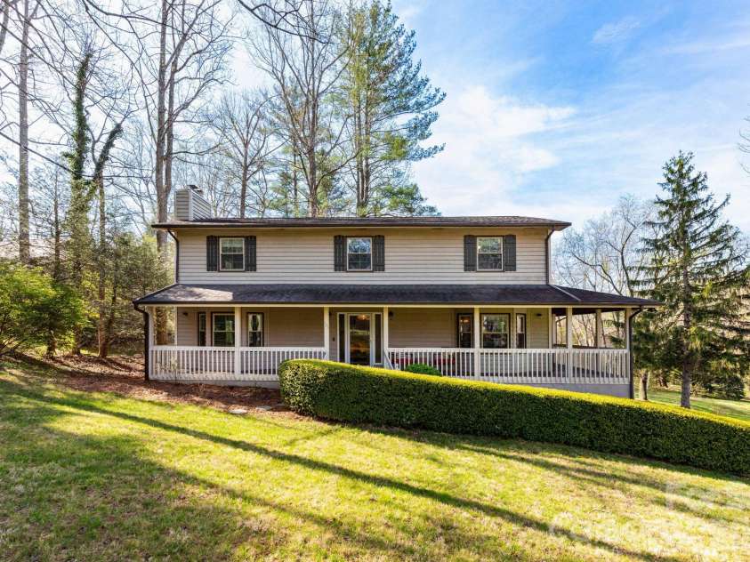 121 Churchill Downs Drive, Fairview, NC 28730.  MLS# CAR4366087, YatesRealty ID 19111. Wraparound Porch