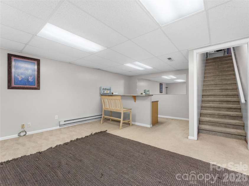121 Churchill Downs Drive, Fairview, NC 28730.  MLS# CAR4420443, YatesRealty ID 19111. Finished Basement