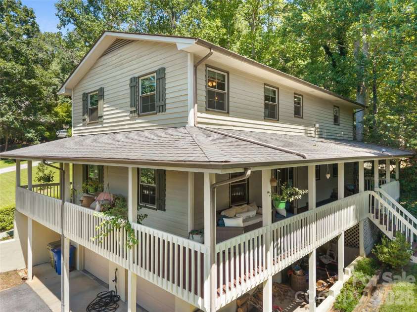 121 Churchill Downs Drive, Fairview, NC 28730.  MLS# CAR4420443, YatesRealty ID 19111. Wraparound Porch