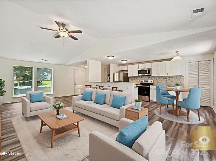 5811 Rock Hollow Drive, Charlotte, NC 28212.  MLS# CAR4268092, YatesRealty ID 19111. Great Room - Staged