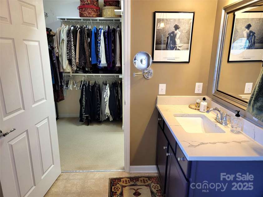 5981 Bison Court, Fort Mill, SC 29707.  MLS# CAR4209412, YatesRealty ID 19113. Main bathroom adjacent to primary bedroom