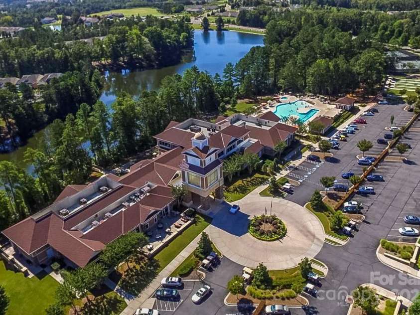 5981 Bison Court, Fort Mill, SC 29707.  MLS# CAR4209412, YatesRealty ID 19113. The Lake House and large outdoor pool