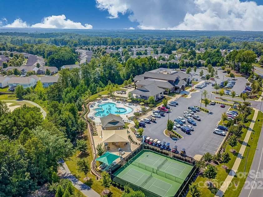 5981 Bison Court, Fort Mill, SC 29707.  MLS# CAR4209412, YatesRealty ID 19113. The Lodge clubhouse, second outdoor pool,and pickleball courts.