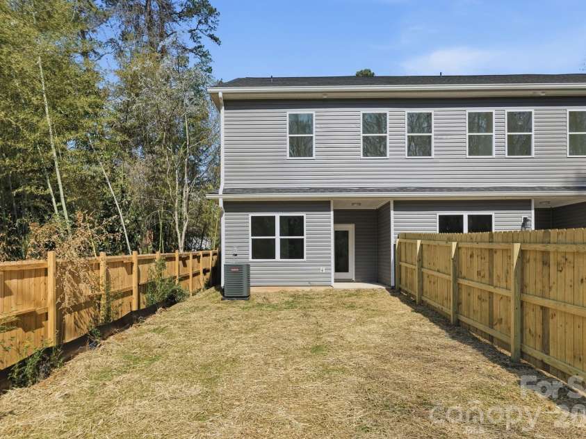 659 Stillgreen Lane, Charlotte, NC 28214.  MLS# CAR4356010, YatesRealty ID 19119. Back of House and Part of Large Backyard