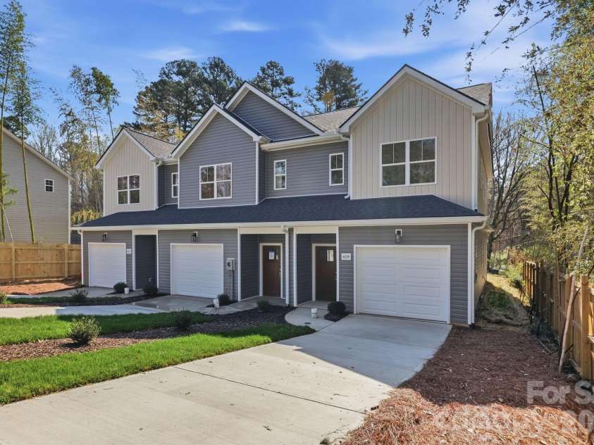 659 Stillgreen Lane, Charlotte, NC 28214.  MLS# CAR4356010, YatesRealty ID 19119. Custom townhouse with NO HOA!!! Investors - Inquire about purchasing all three units!