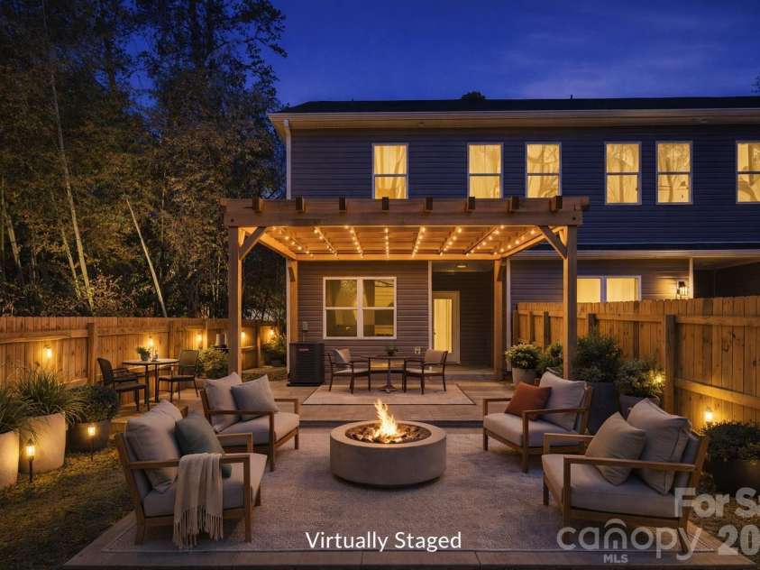 659 Stillgreen Lane, Charlotte, NC 28214.  MLS# CAR4356010, YatesRealty ID 19119. Imagine the possibilities (night)! Virtually Staged Photo