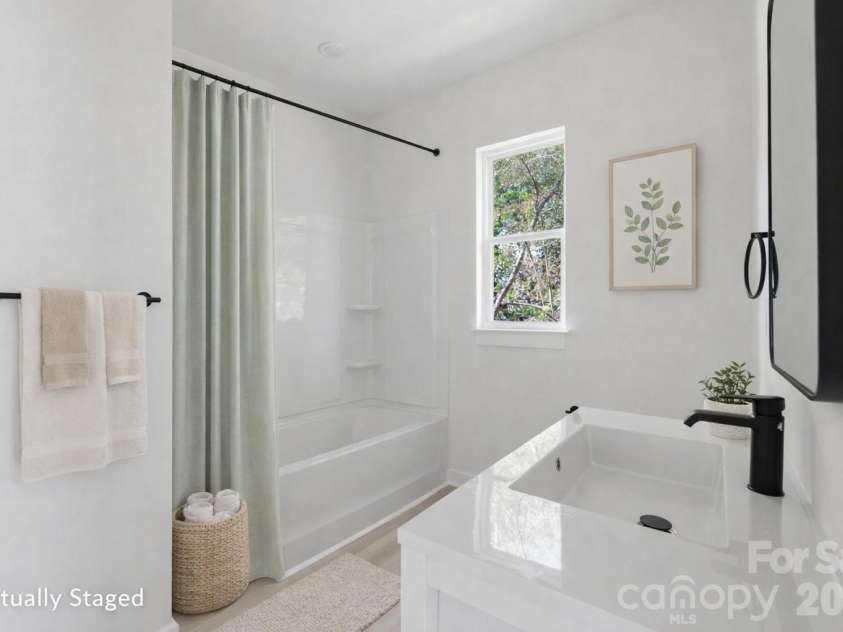 659 Stillgreen Lane, Charlotte, NC 28214.  MLS# CAR4356010, YatesRealty ID 19119. Primary Bathroom - Virtually Staged Photo