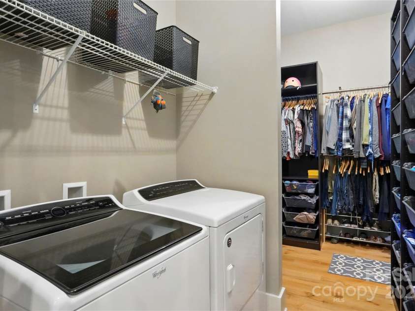 16525 Tulloch Road, Charlotte, NC 28278.  MLS# CAR4267483, YatesRealty ID 19120. Laundry room with access to primary walk-in closet