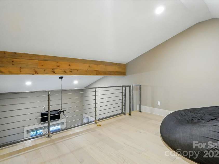 16525 Tulloch Road, Charlotte, NC 28278.  MLS# CAR4267483, YatesRealty ID 19120. Loft in primary suite is perfect for library, study, or just a place to relax