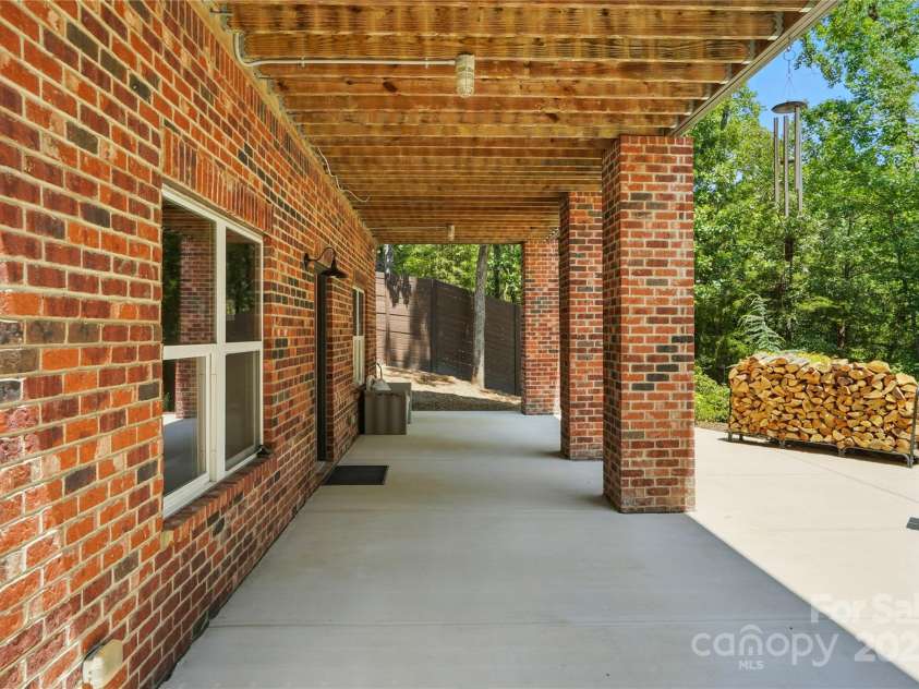 16525 Tulloch Road, Charlotte, NC 28278.  MLS# CAR4267483, YatesRealty ID 19120. Step outside to your personal outdoor oasis, an entertainer's dream