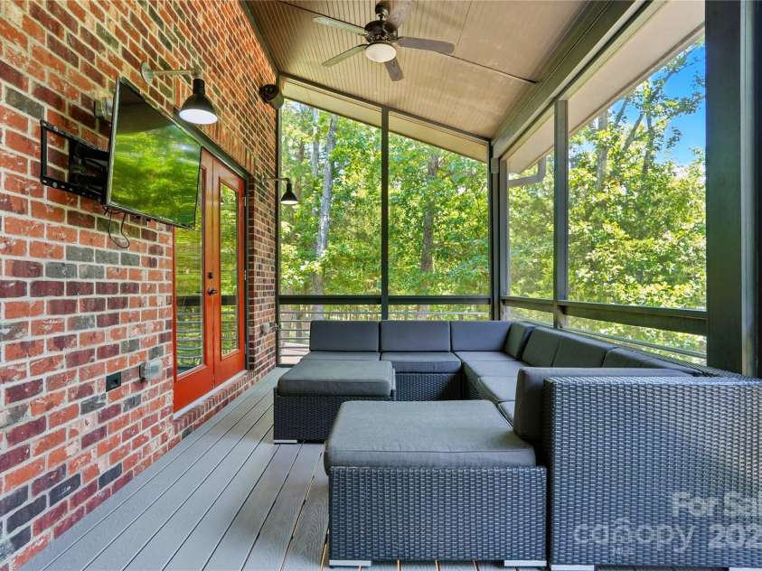16525 Tulloch Road, Charlotte, NC 28278.  MLS# CAR4267483, YatesRealty ID 19120. The covered screened porch with durable Trex decking extends your living space outdoors