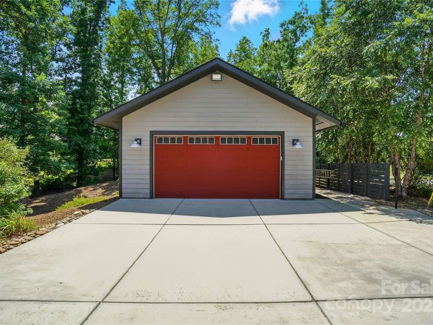 16525 Tulloch Road, Charlotte, NC 28278.  MLS# CAR4267483, YatesRealty ID 19120. There's even room for all your gear w/ a huge detached garage, carport/RV parking, & bike stand