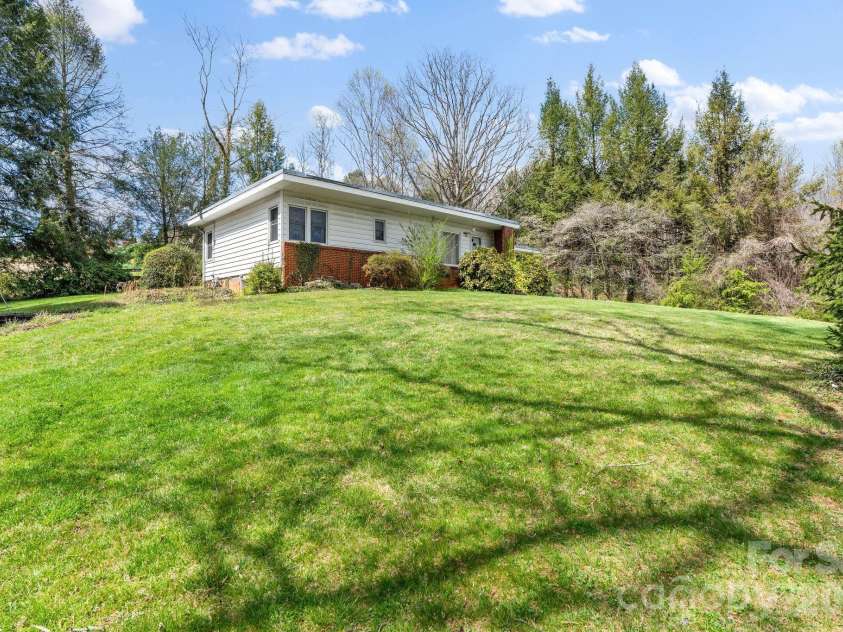 7 Acton Woods Road, Candler, NC 28715.  MLS# CAR4362191, YatesRealty ID 19120. 