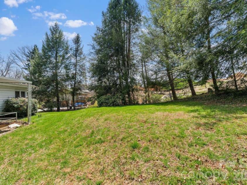 7 Acton Woods Road, Candler, NC 28715.  MLS# CAR4362191, YatesRealty ID 19120. 