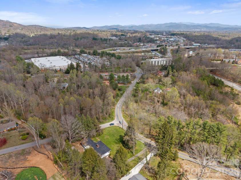 7 Acton Woods Road, Candler, NC 28715.  MLS# CAR4362191, YatesRealty ID 19120. 