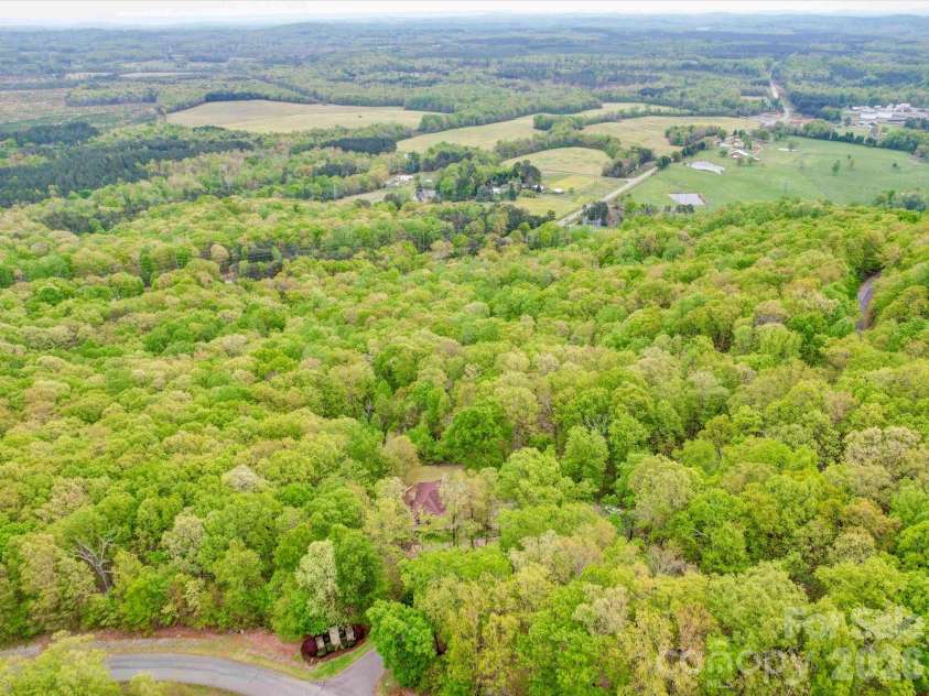 135 Boulder Ridge Drive, Denton, NC 27239.  MLS# CAR4244687, YatesRealty ID 19121. Home wi/Backyard view