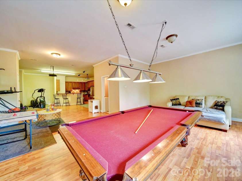 135 Boulder Ridge Drive, Denton, NC 27239.  MLS# CAR4244687, YatesRealty ID 19121. Large downstairs room in basement