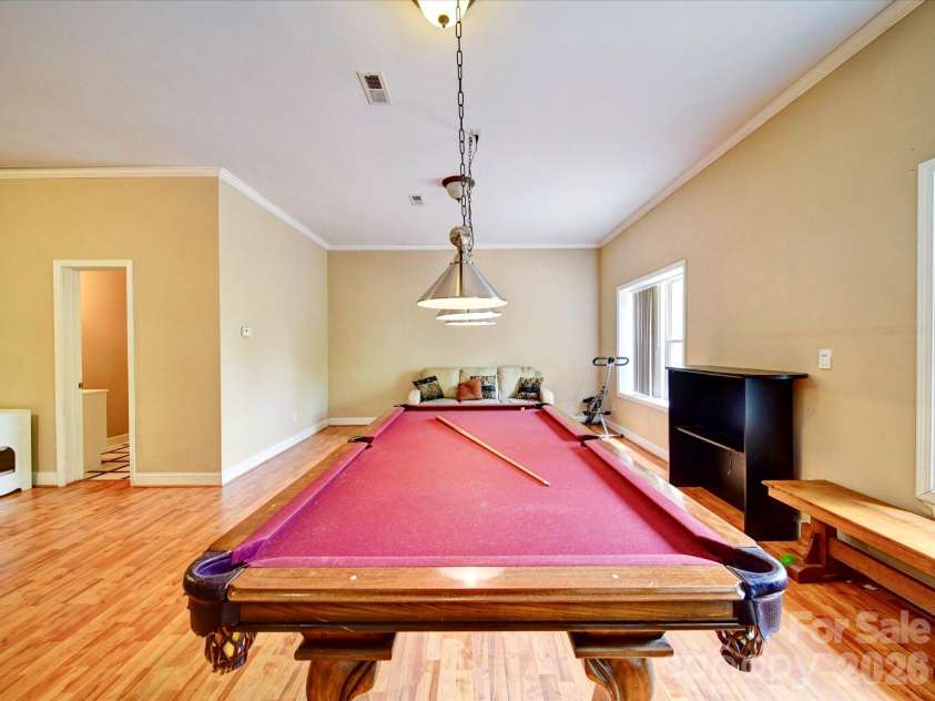 135 Boulder Ridge Drive, Denton, NC 27239.  MLS# CAR4244687, YatesRealty ID 19121. Pool Table downstairs
